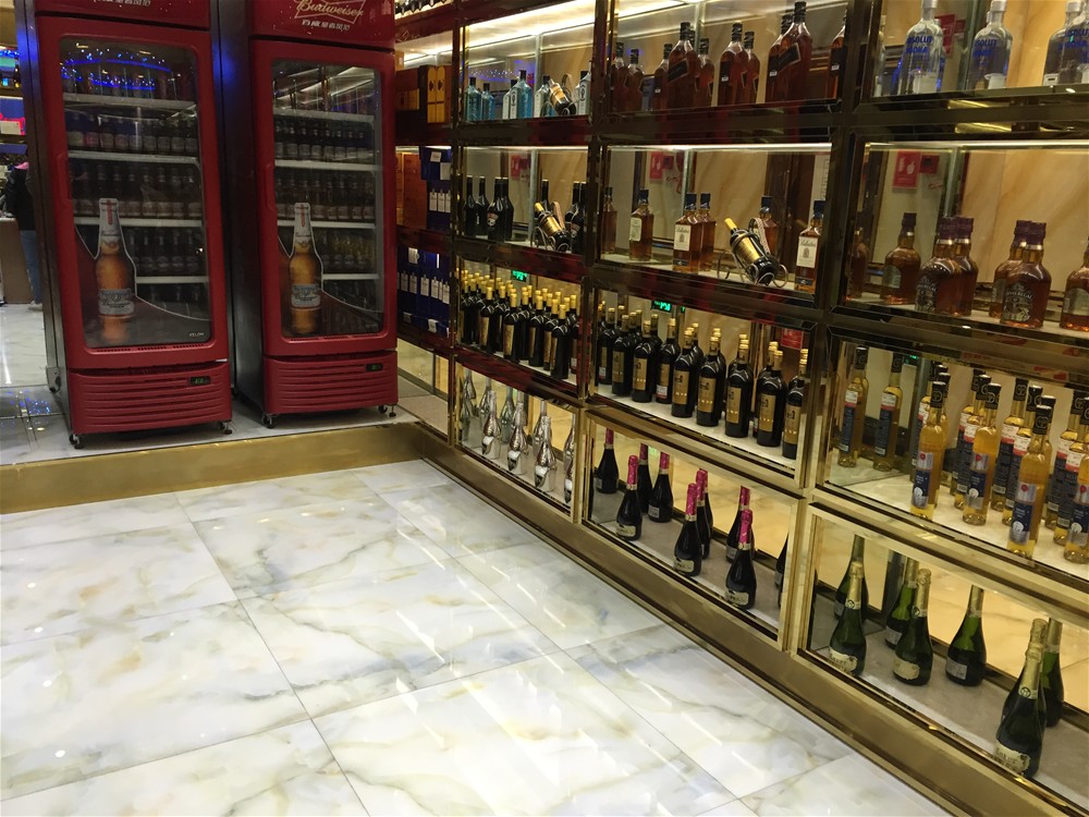 KTV公共区接纳永利yl23455瓷砖微晶石西班牙-翡翠玉KWD58001铺贴